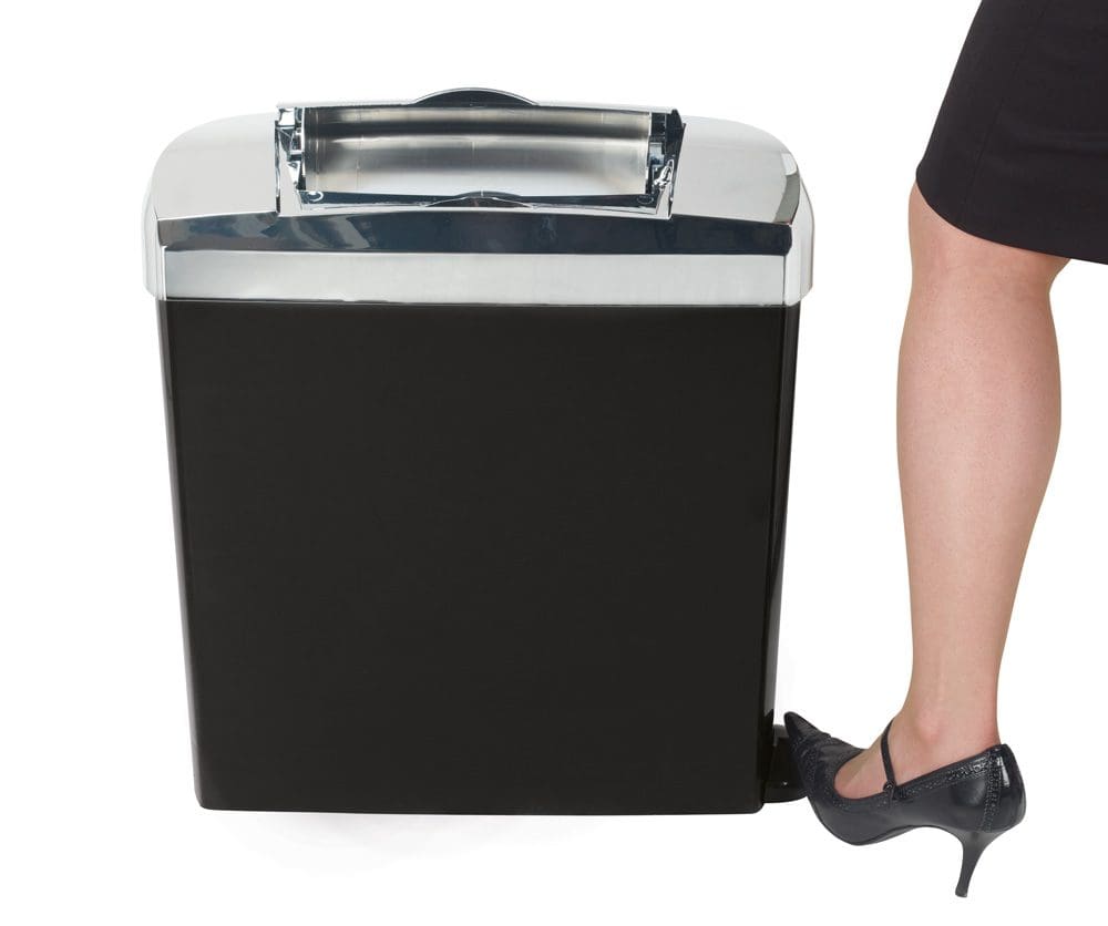 Stylish sanitary bin, pedal operated. Lady operating the pedal on an Elite sanitary bin